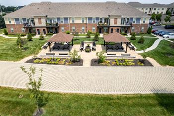 A large building with a lawn in front of it.